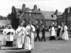 Dedication of the Chapel, Bow Arrow. At Albans Church Wardens Thomas Crowhurst and Norman Beater followed by Rev White, Bishop Say and his servers, 1961.