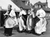 Dedication of the Chapel, Bow Arrow, 12th July 1961. Rev Peter White leading Bishop Say.