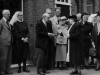 Mrs E Boswell handing the key to Dr T Fathing during the opening of Fathing ward. Watching L-R Rev P Collins, Mr E J Hobbs, Miss Bignall Matron and members of the committee.
