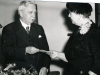 1955, October. Mr Parry retiring from the Dartford Hospital Management Committee. Receiving a gift from Mrs Flora Welch, Vice Chairman.