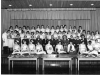 1963 Group Prizegiving. Matron Waugh, Matron Brown, Matron Couzins, Mr Moore (HMC), Mayor Lanyon, Mr Kekwick (HMC Chair), Mr T Meyrick Thomas (Surgeon), Miss Gantry (Midwife), Miss Hargreaves (Midwife), Miss Radley (Nurse Tutor)
