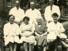 Lab and Pharmacy Staff, Sothern 1959. Mr Watchorn (Pharmacist), E Freed (Porter), Dr Burne (Pathologist), Seated Pharmacy Clerk, domestics and Mrs Macey (Technician). Dr Burne transfered to Joyce Green at closure until retirement.