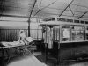 Transferring a patient to the tram c.1920